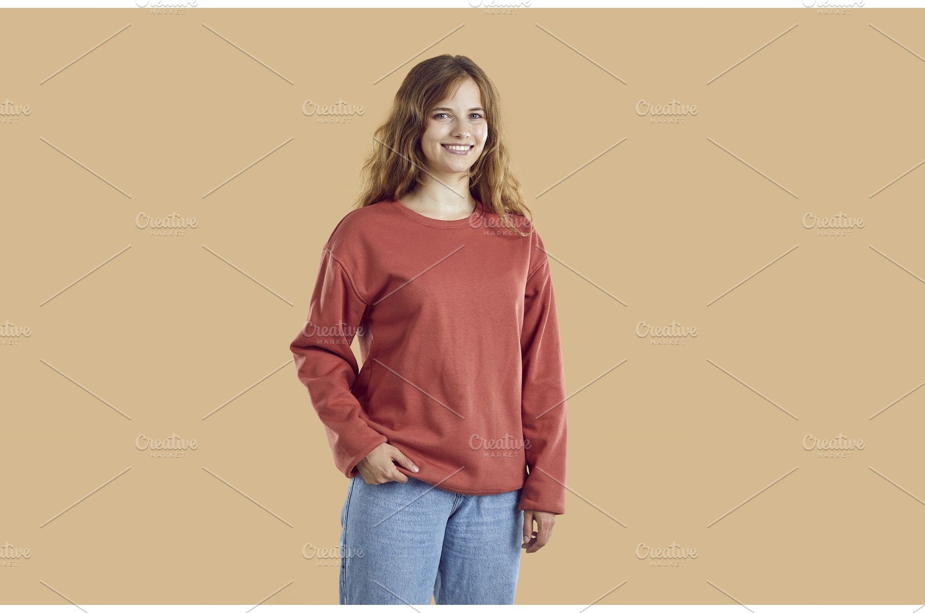 Young smiling woman wearing red, a Person Photo by StudioRomantic