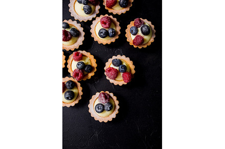 Top view tartalets pattern with copy, a Food & Drink Photo by oksix