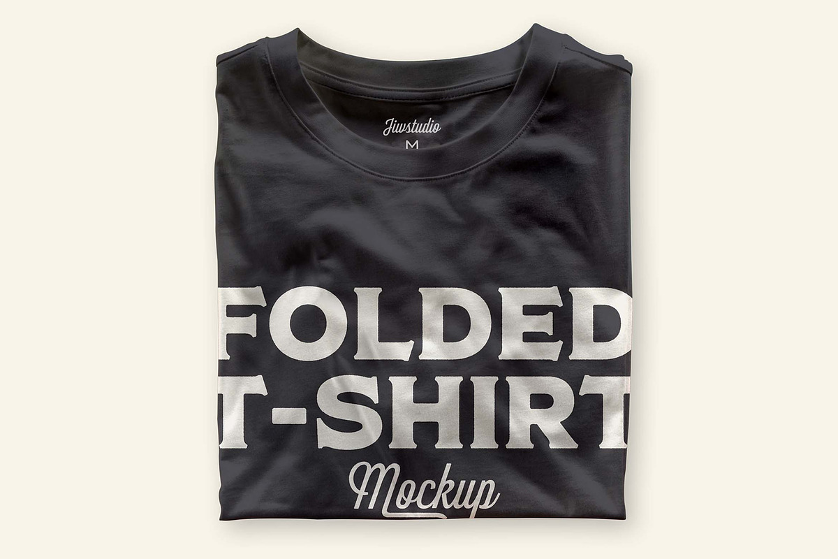 Folded T-shirt Mockup, a Shirt Mockup by jiwstudio (Photo 1 of 5)