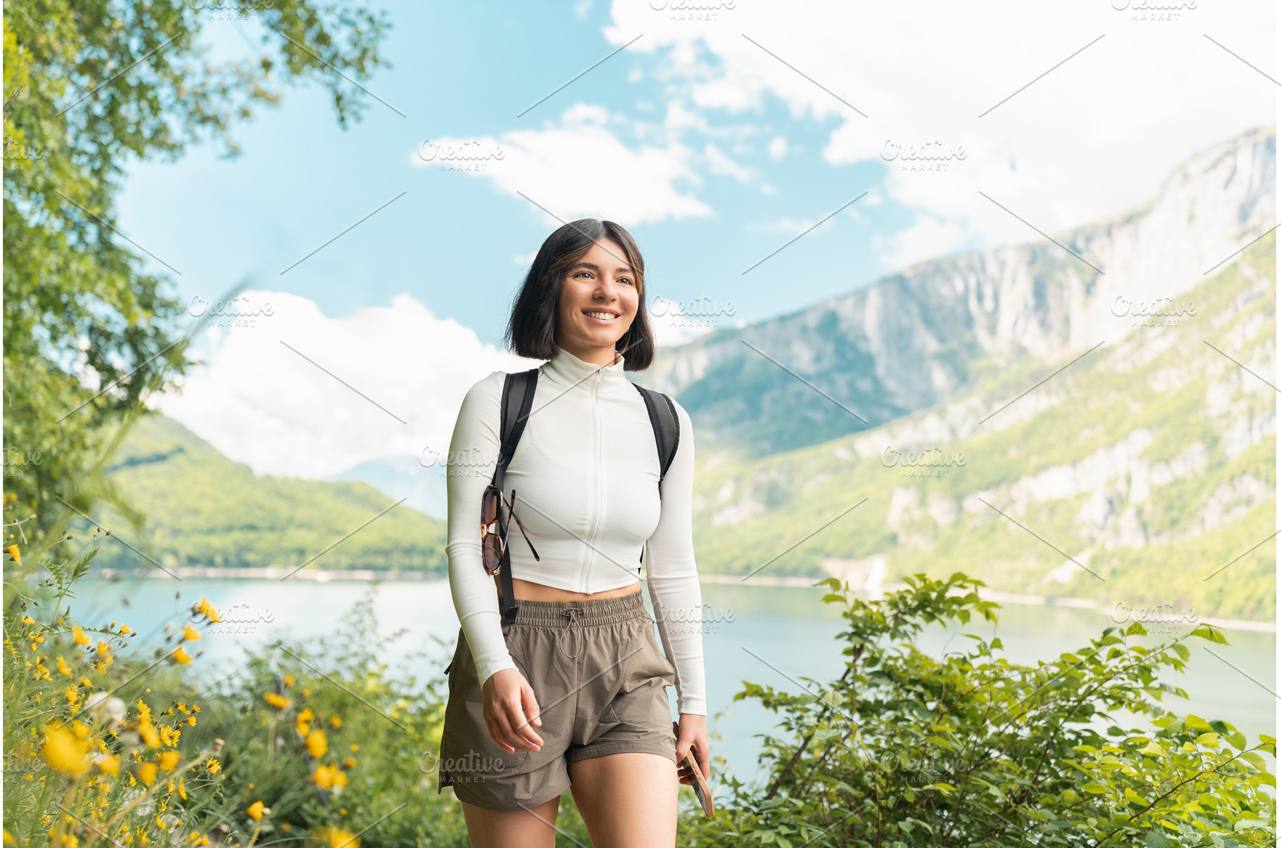 Smiling wide, a woman follows a, a Person Photo by AD Stock Images