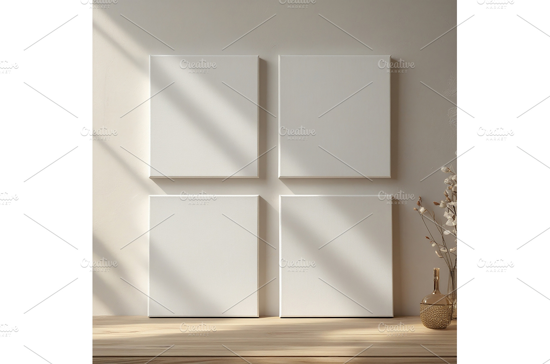 Four blank canvases on the wall with, an Architecture Photo by Canatic
