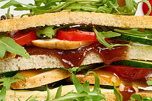 Sandwich with grilled chicken, fresh cucumber, tomato, arugula a, a Food & Drink Photo by ndanko