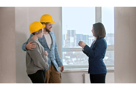 A real estate agent showing keys to, a Person Photo by Barcelona_dreams