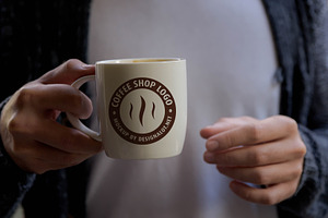 Man Holding Coffee Mug Mockup 2