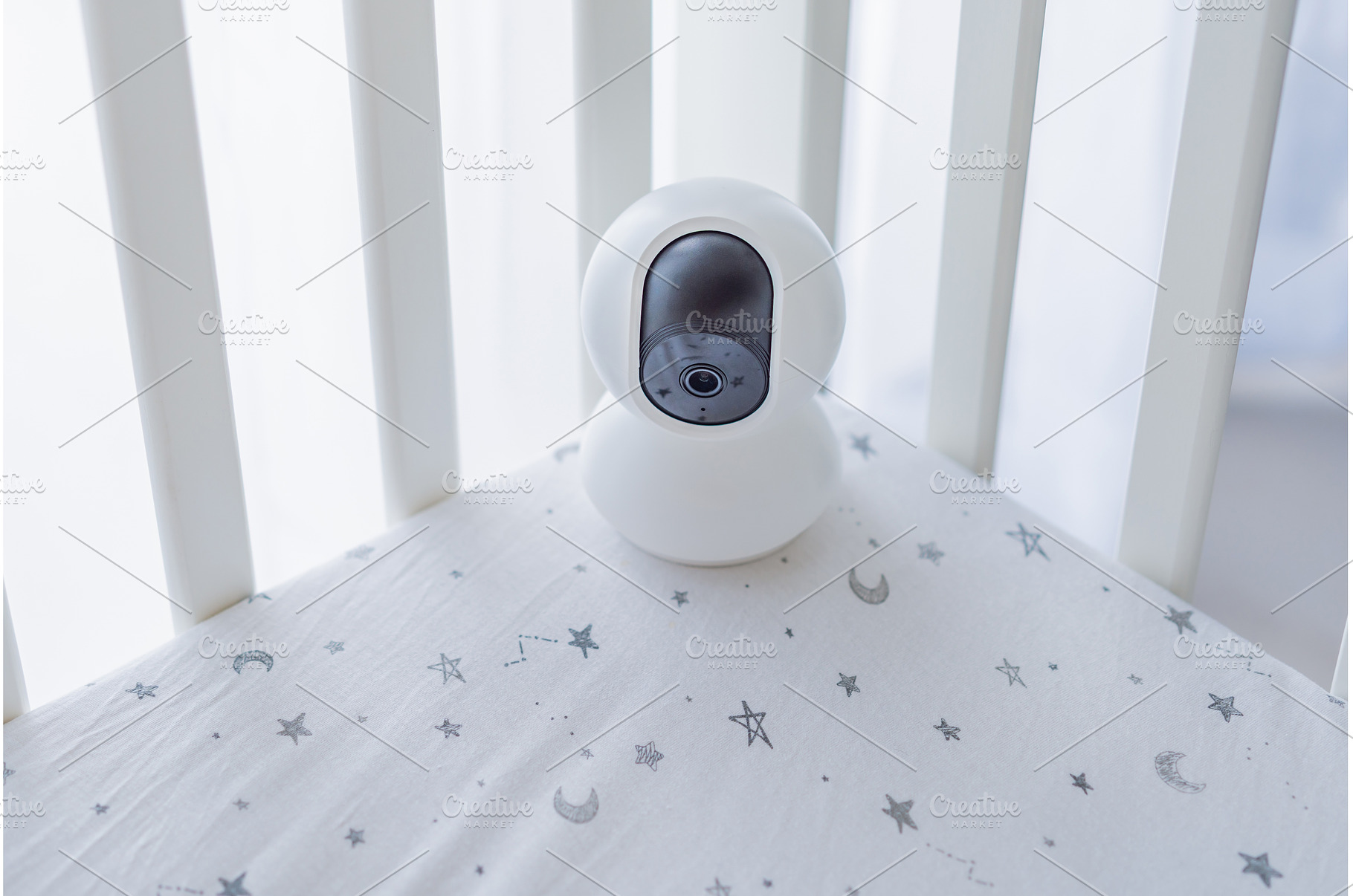 Baby monitor camera placed inside a, a Technology Photo by Elizaveta Galitskaya
