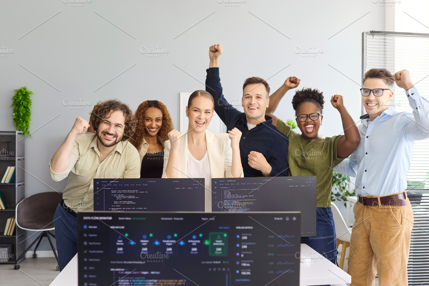Startup Team Cheering with Arms Up, a Person Photo by StudioRomantic
