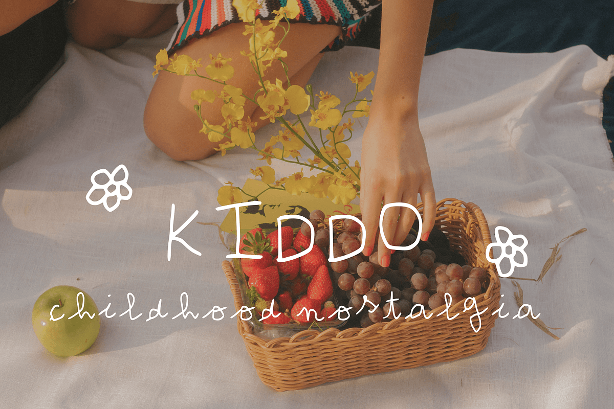Kiddo - a clumsy & nostalgic font, a Handwritten Font by Iasan Design (Photo 1 of 6)