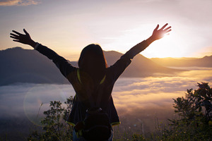 Happy woman in the mountains stock photo containing joy and outdoor, a Person Photo by Nednapa
