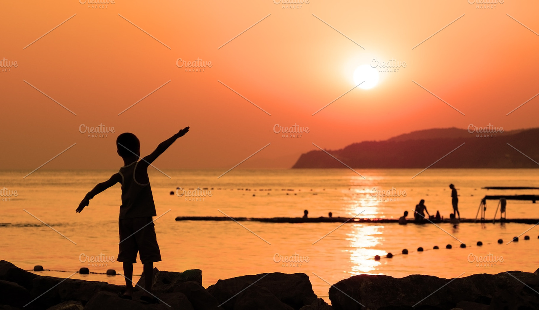 Silhouette Of Child Against Sunset