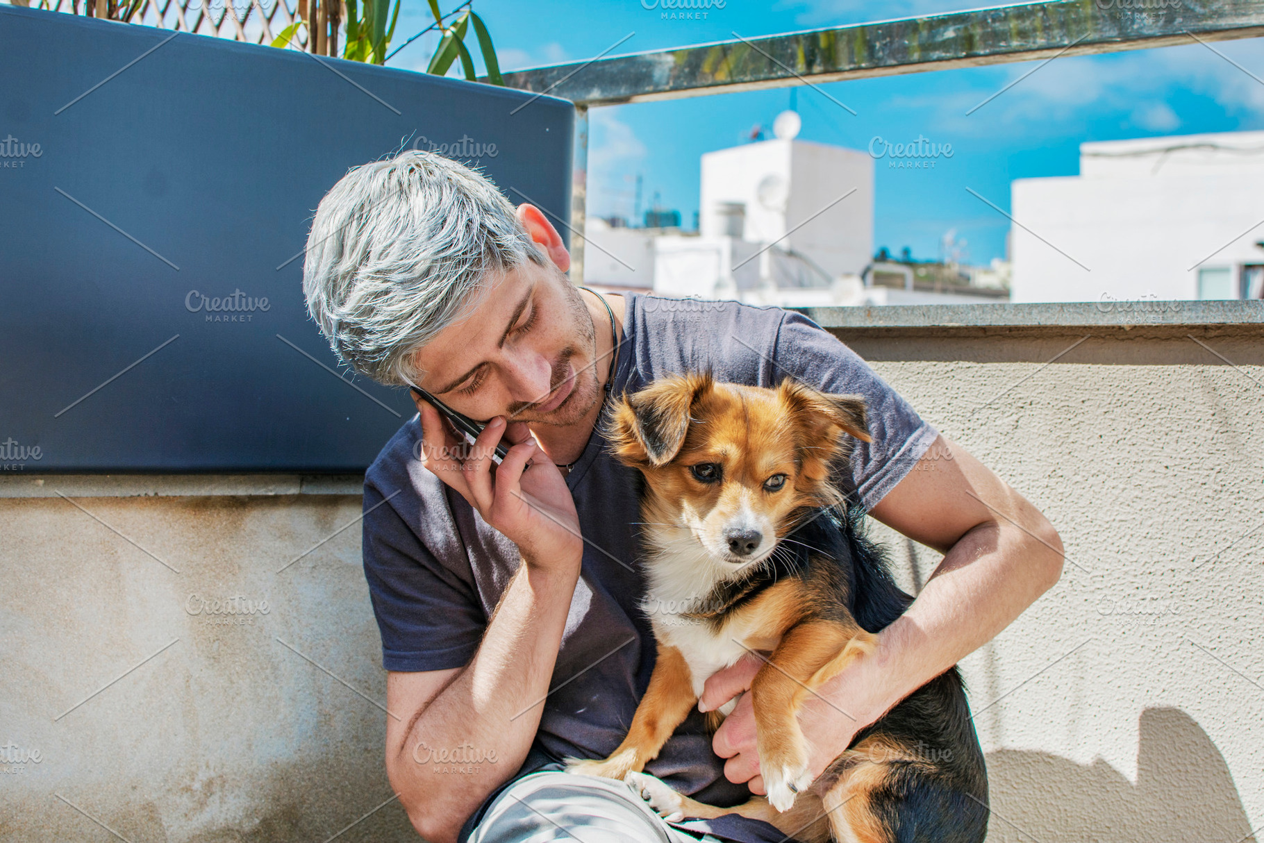 Man with his dog, talking to phone., an Animal Photo by RaquelVizcaíno