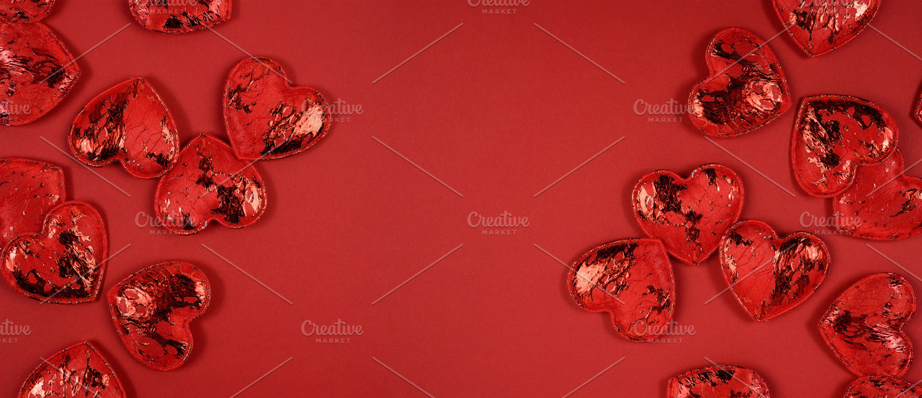 A multitude of glittery red decorative hearts are arranged on th, a Holiday Photo by ndanko