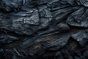 Black burnt wood texture background,