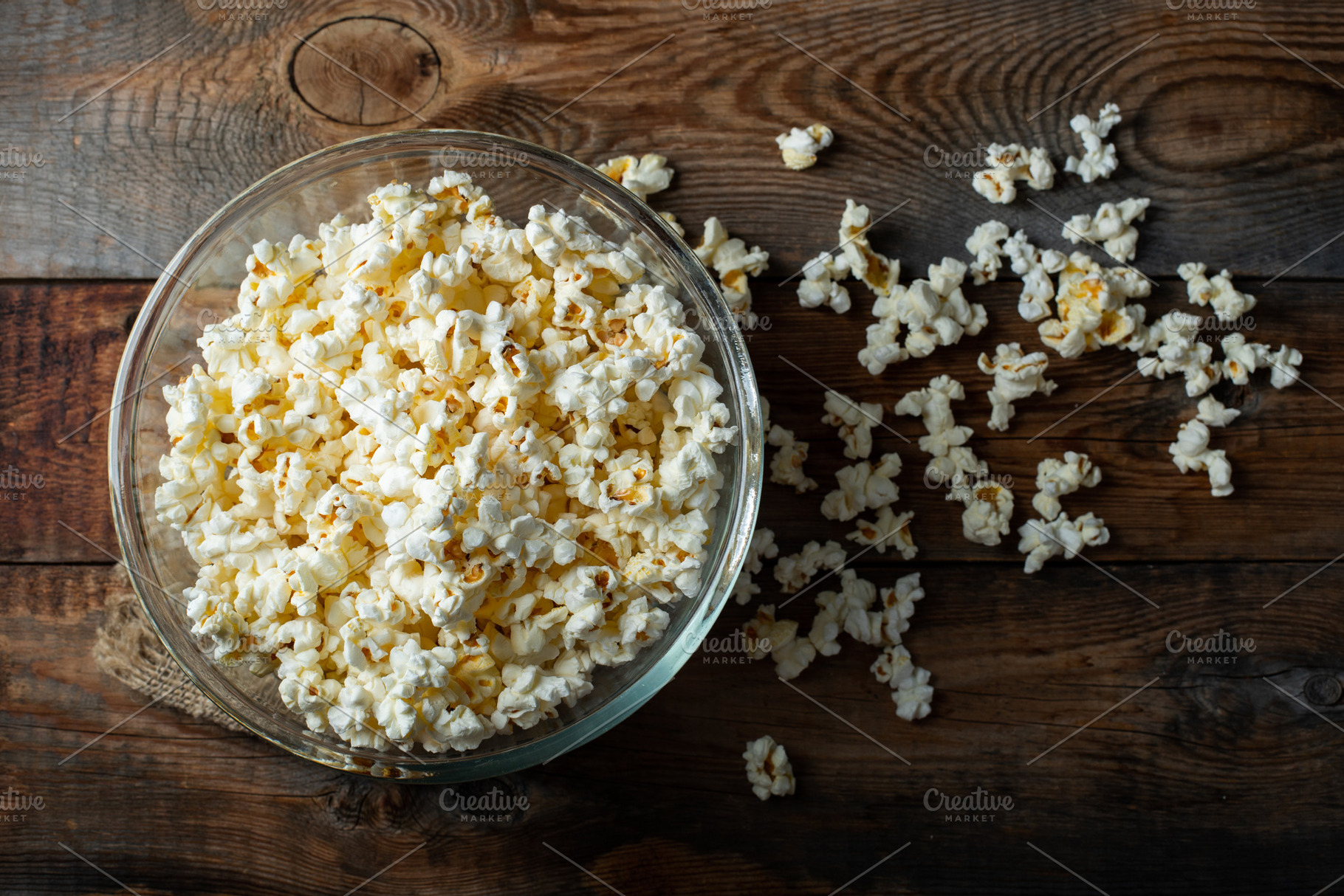 Pop corn on wood color background.Food and snack concepts ideas.Minimal style t, a Food & Drink Photo by Budarinphoto
