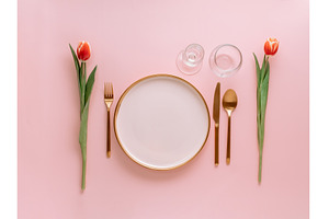 Pink festive table setting on pink, a Food & Drink Photo by Fascinadora