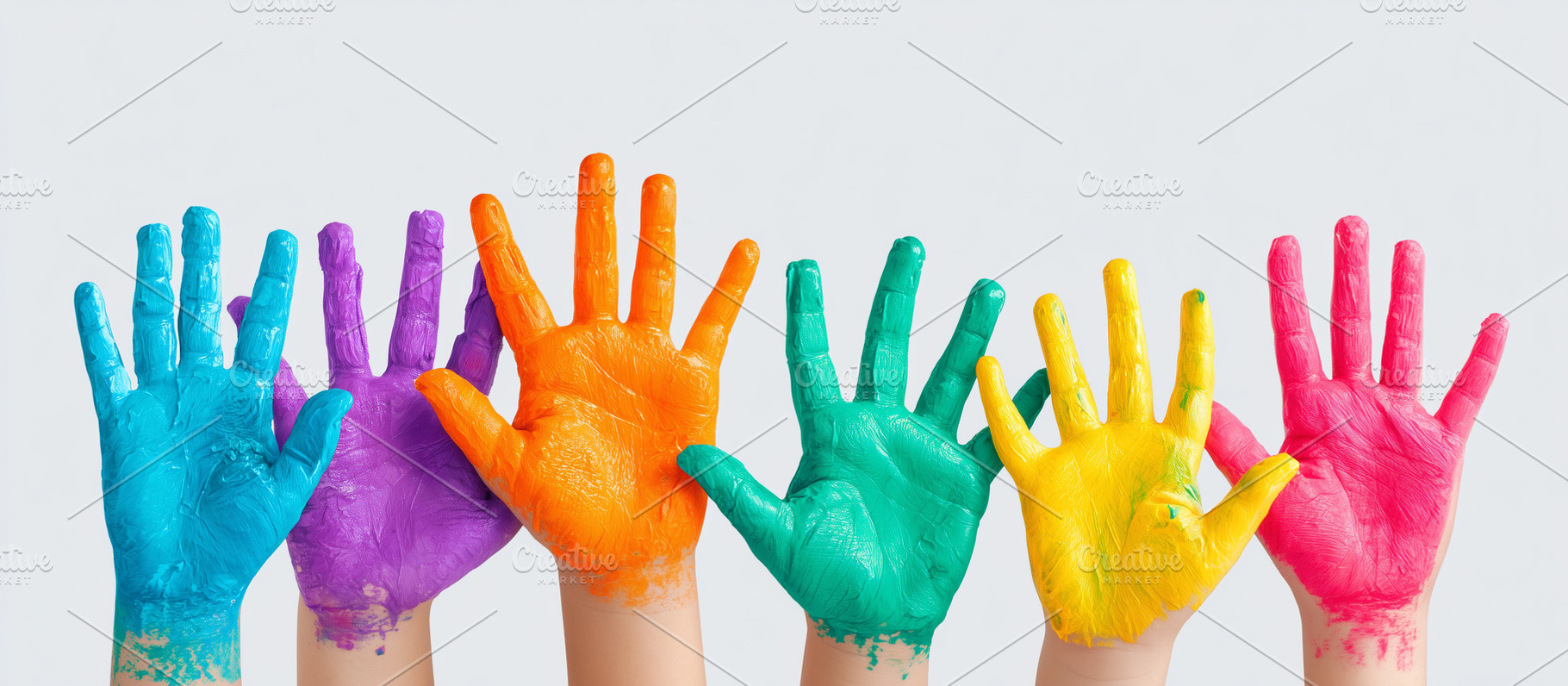 Colorful painted hands raised up, a Person Photo by MistyDay