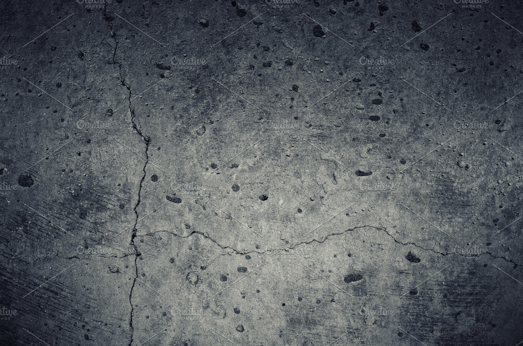 Concrete wall texture with cracks containing abstract, aged, and ancient