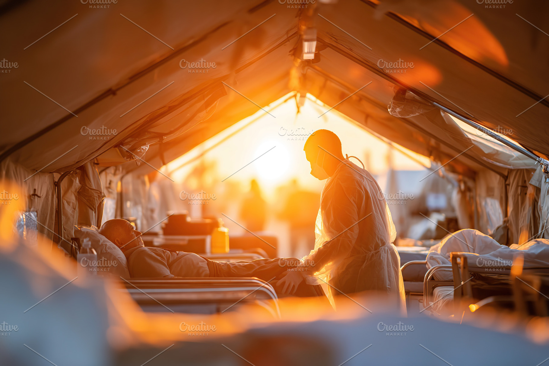 Healthcare workers provide care to patients in outdoor tents during sunset hour, a Photo by AlyaAnd