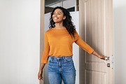 Happy Black Young Woman Entering Apartment Opening Entry Door, a Photo by Prostock-Studio (Thumbnail 2 of 2)