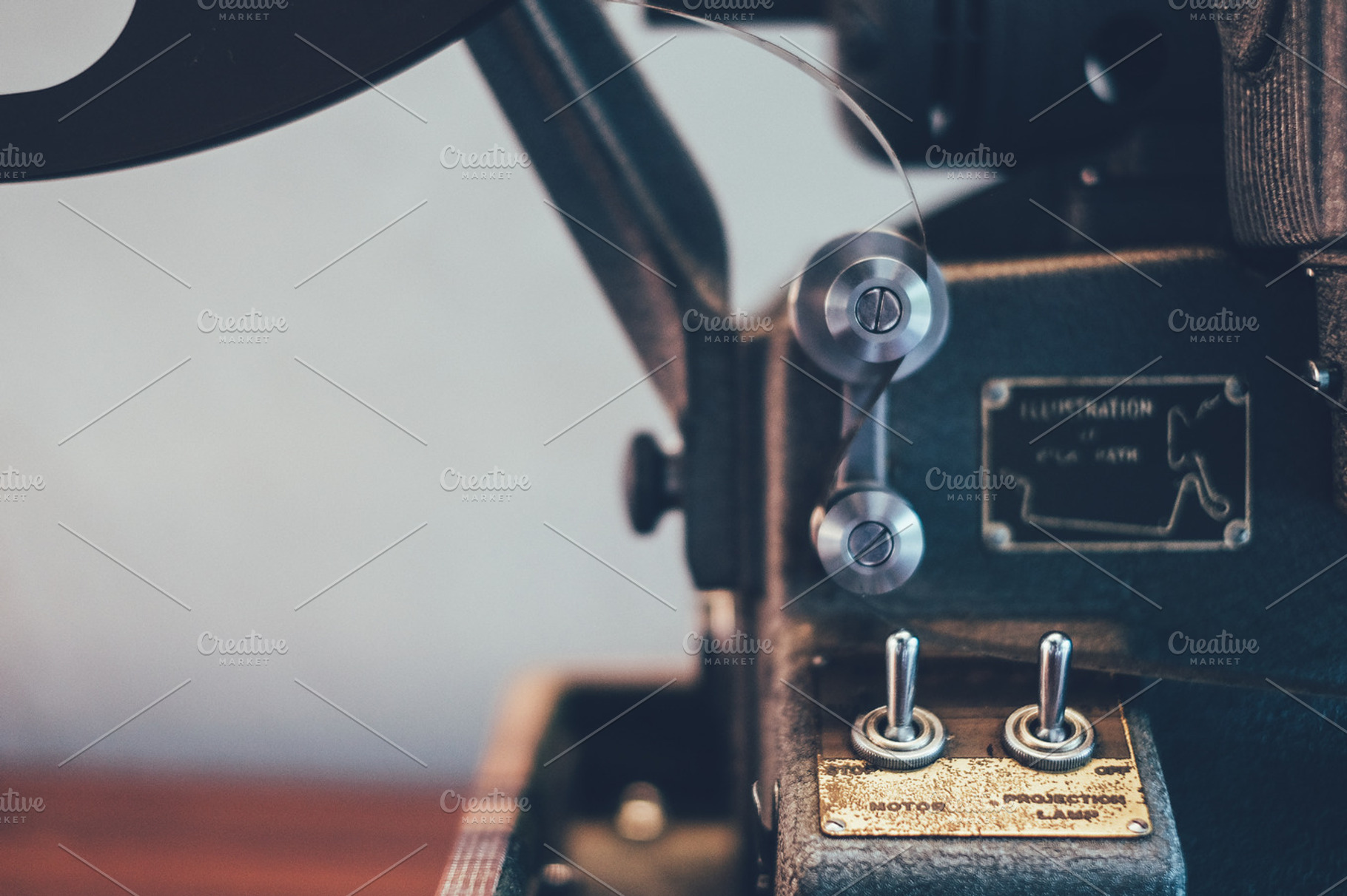 Vintage projector stock photo containing projector and projection, an Industrial Photo by The Kandid