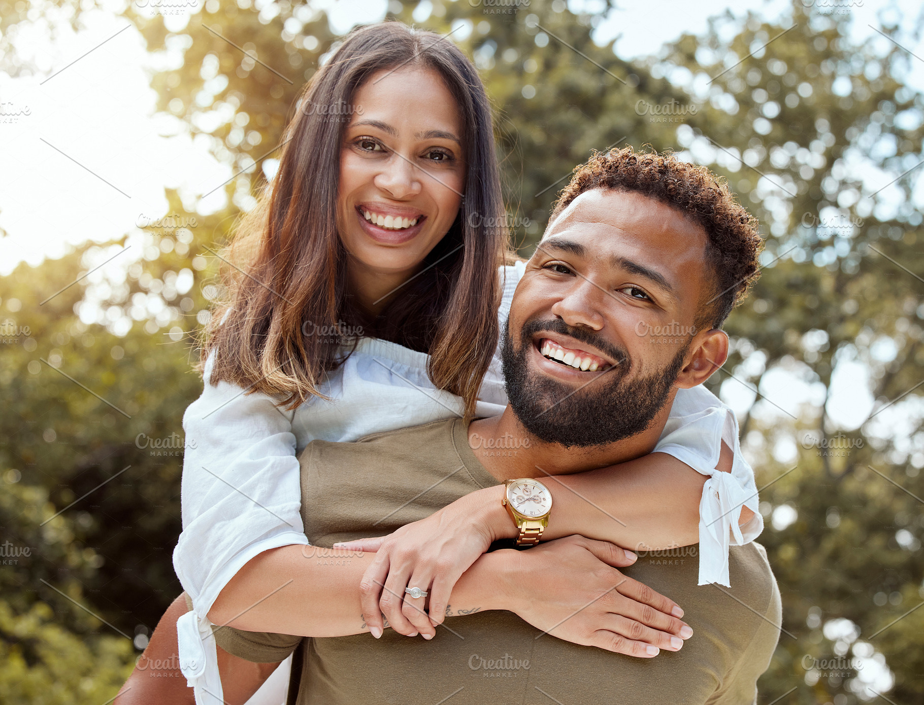 Love, black couple and with smile hug, bonding and happy together outdoor for fun, loving and embrace. Portrait, romance and man with woman with happiness, for marriage, relationship and celebrate., a Photo by Peopleimages.com