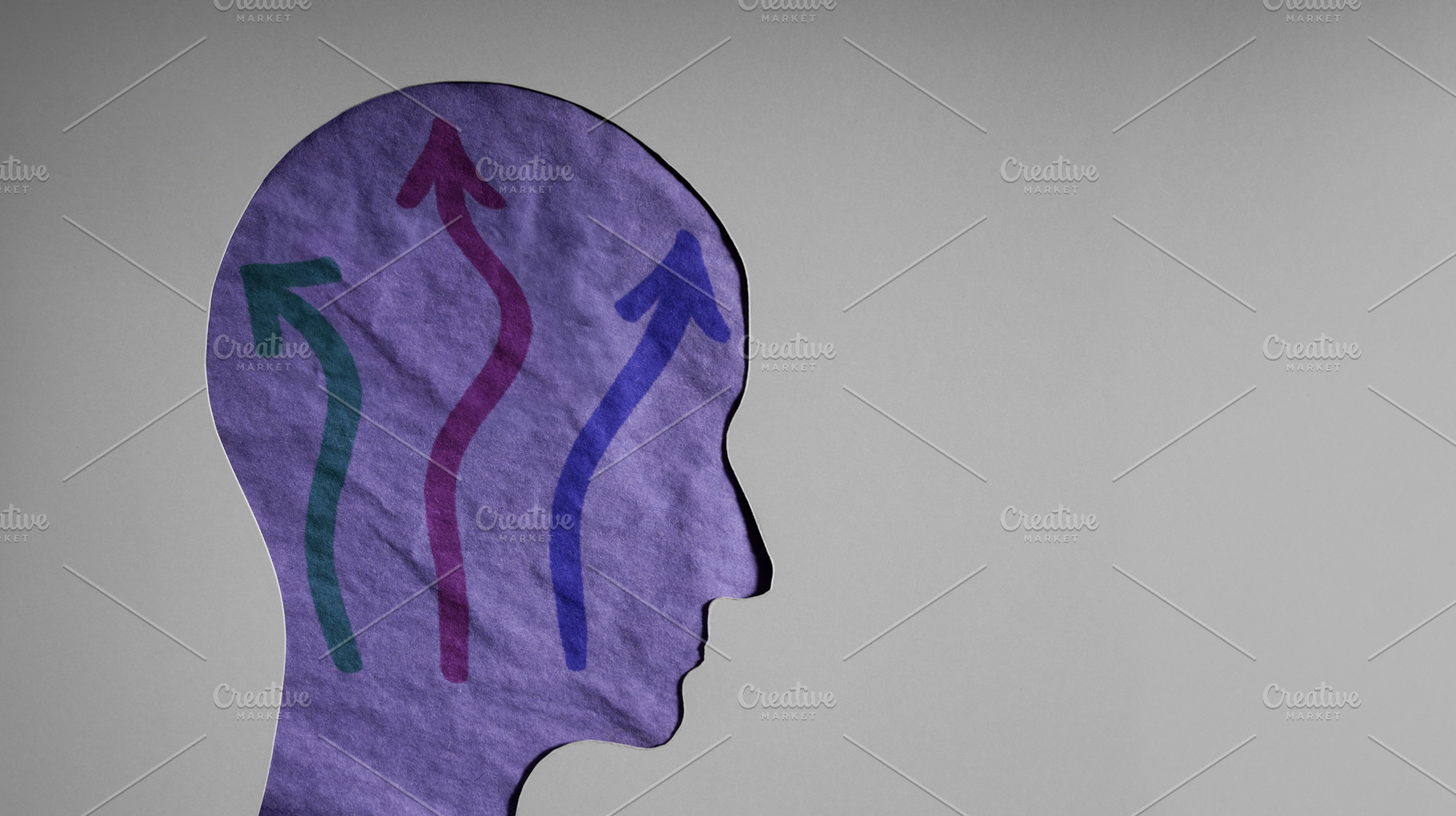Human head with arrows showing stress, anxiety, confusion, a Photo by salmon.black