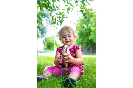 The child eats ice cream on the, a Person Photo by yanadjana