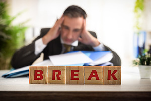 Stressed Businessman Needing Break During Workday, a Business Photo by Davizro's Market