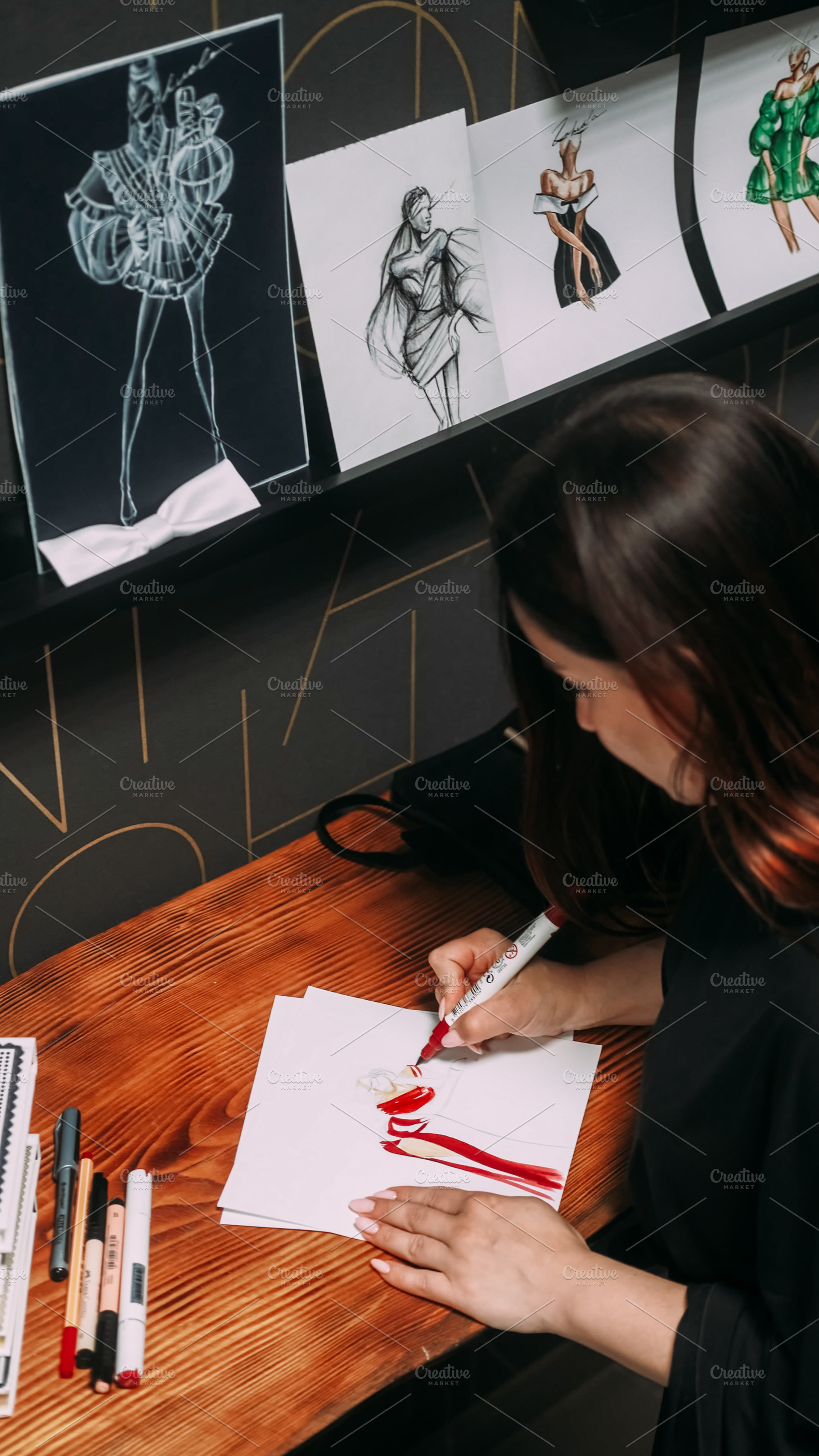 Designer workspace apparel sketch dressmaker draft, a Person Photo by Photo Drive Studio