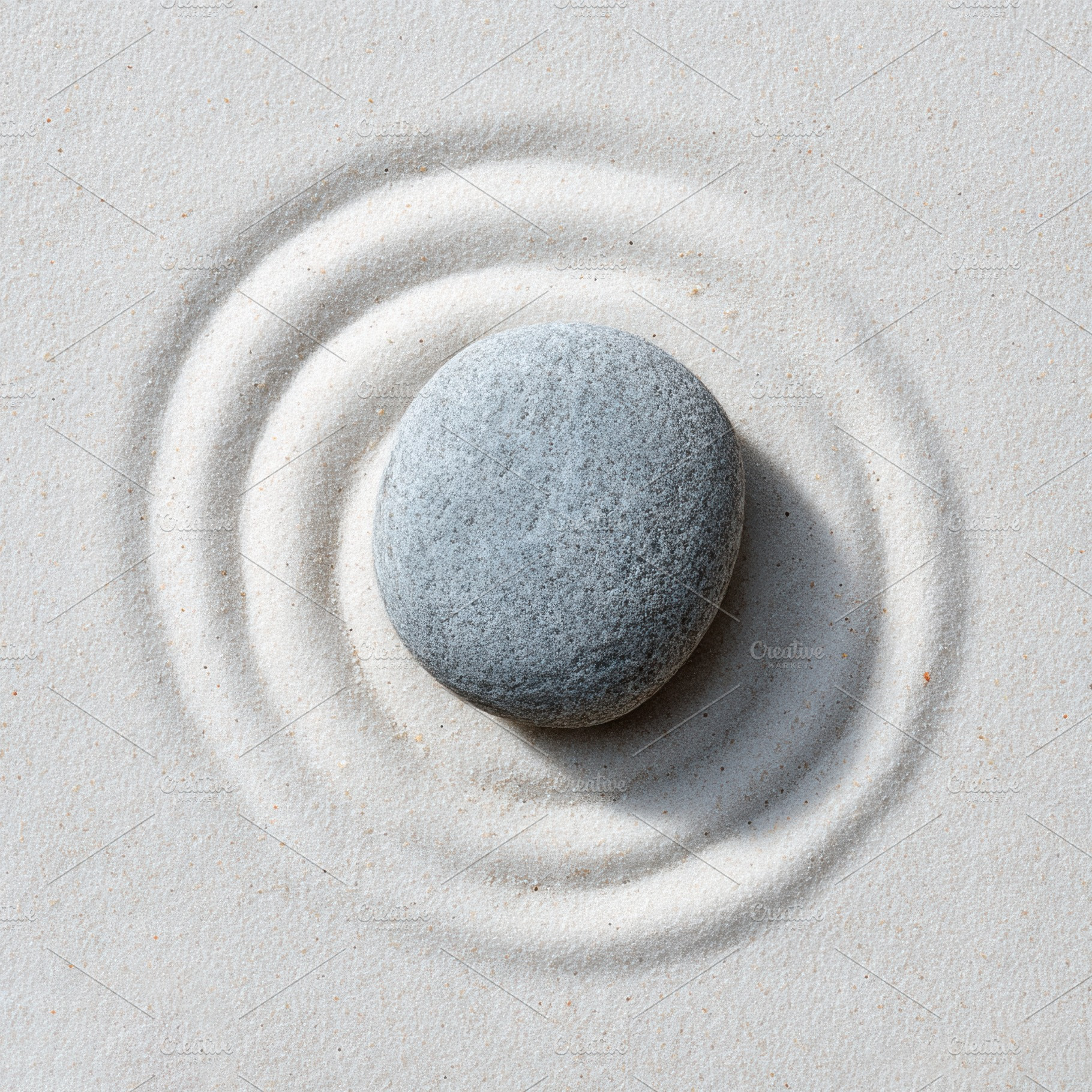 Pebble stone centered on white sand, a Wallpaper Photo by Virgo Studio