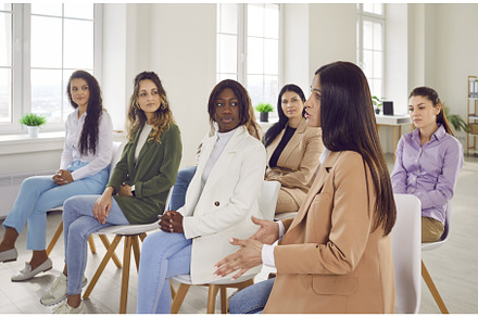 Diverse women gathered together