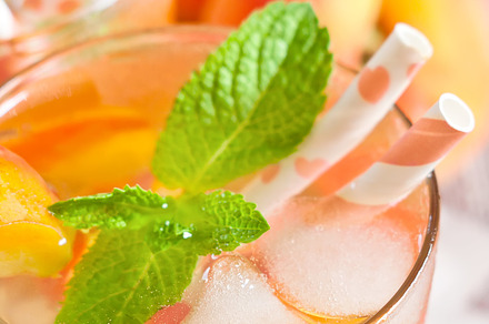 Peach lemonade containing summer, juice, and fresh