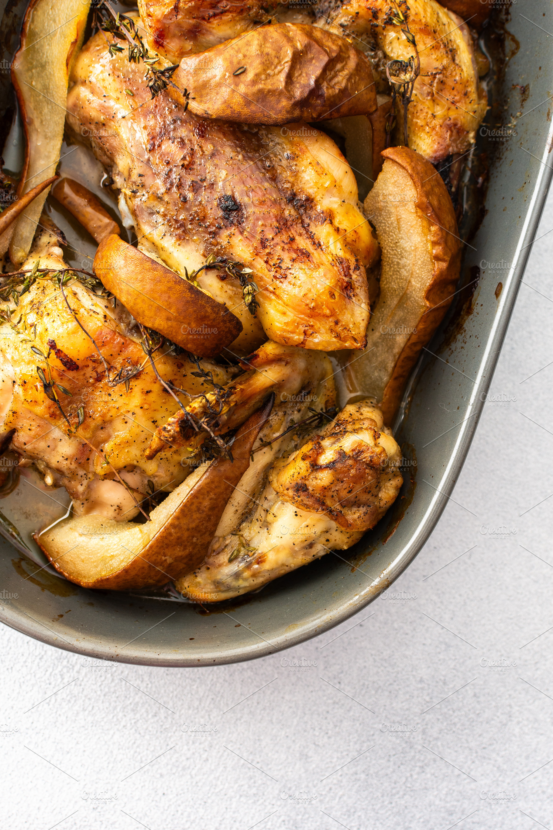 Baked chicken with pears and thyme, a Food & Drink Photo by Pundateam