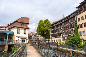 Walkway and half-timbered houses in Petite France Strasbourg, an Architecture Photo by GoodGoods