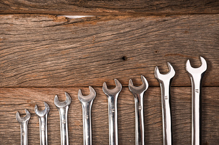 Standard construction safety containing wrench, set, and background