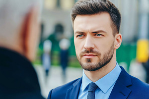 Confident young businessman in suit, a Business Photo by MistyDay