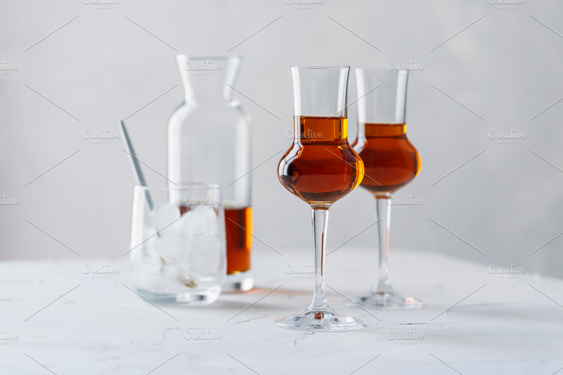 A shot of a strong ligueur with ice containing selective focus, copy space, a Food & Drink Photo by oxana.denezhkina