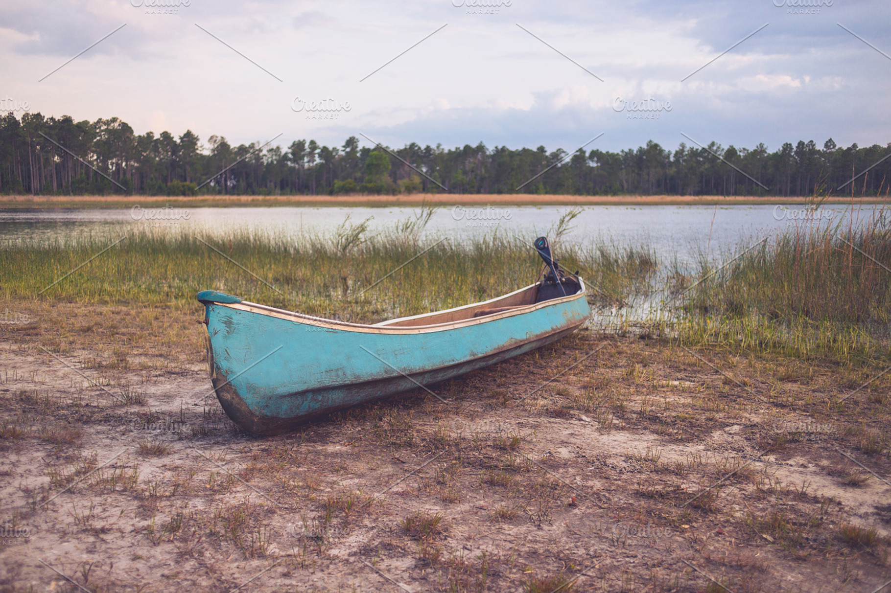 Small Motorized Canoe on Lake Shore, a Nature Photo by Shots by Sleeven