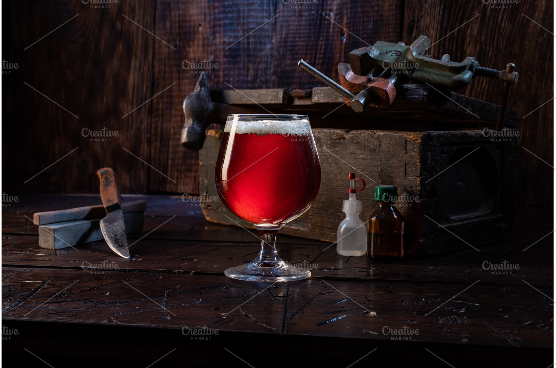 A glass of beer in the workshop, a Food & Drink Photo by Stockphoto by vzwer