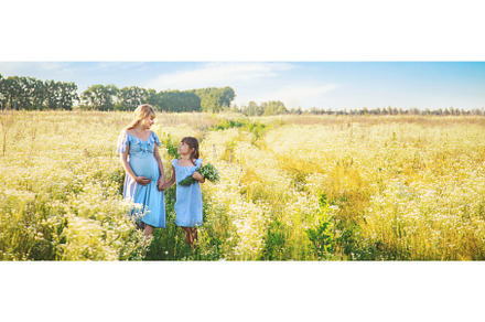pregnant woman with daughter in a, a Person Photo by yanadjana