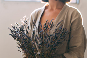 Artisan sensual woman holds lavender