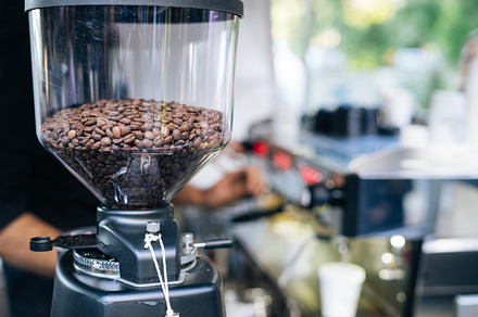 Coffee grinder stock photo containing coffee and beans