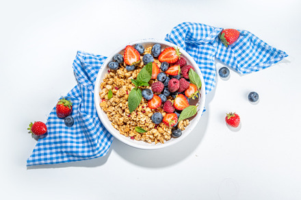 Healthy breakfast granola with berry, a Food & Drink Photo by Rimma