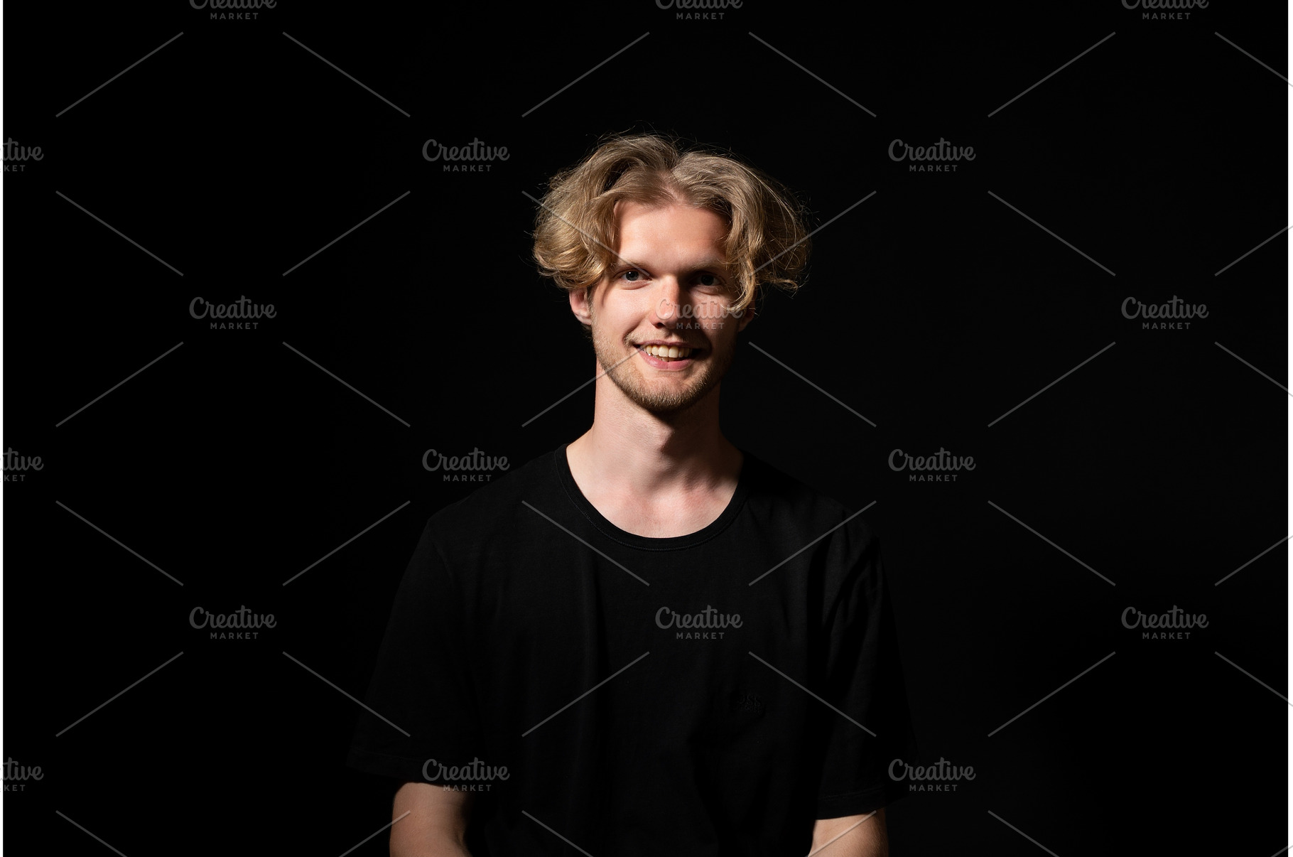 Young blonde man smiling, expressing, a Person Photo by volodymyrshtun13795