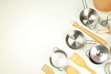 Different kitchen utensil on white background, top view, a Food & Drink Photo by AtlasStudio PRO