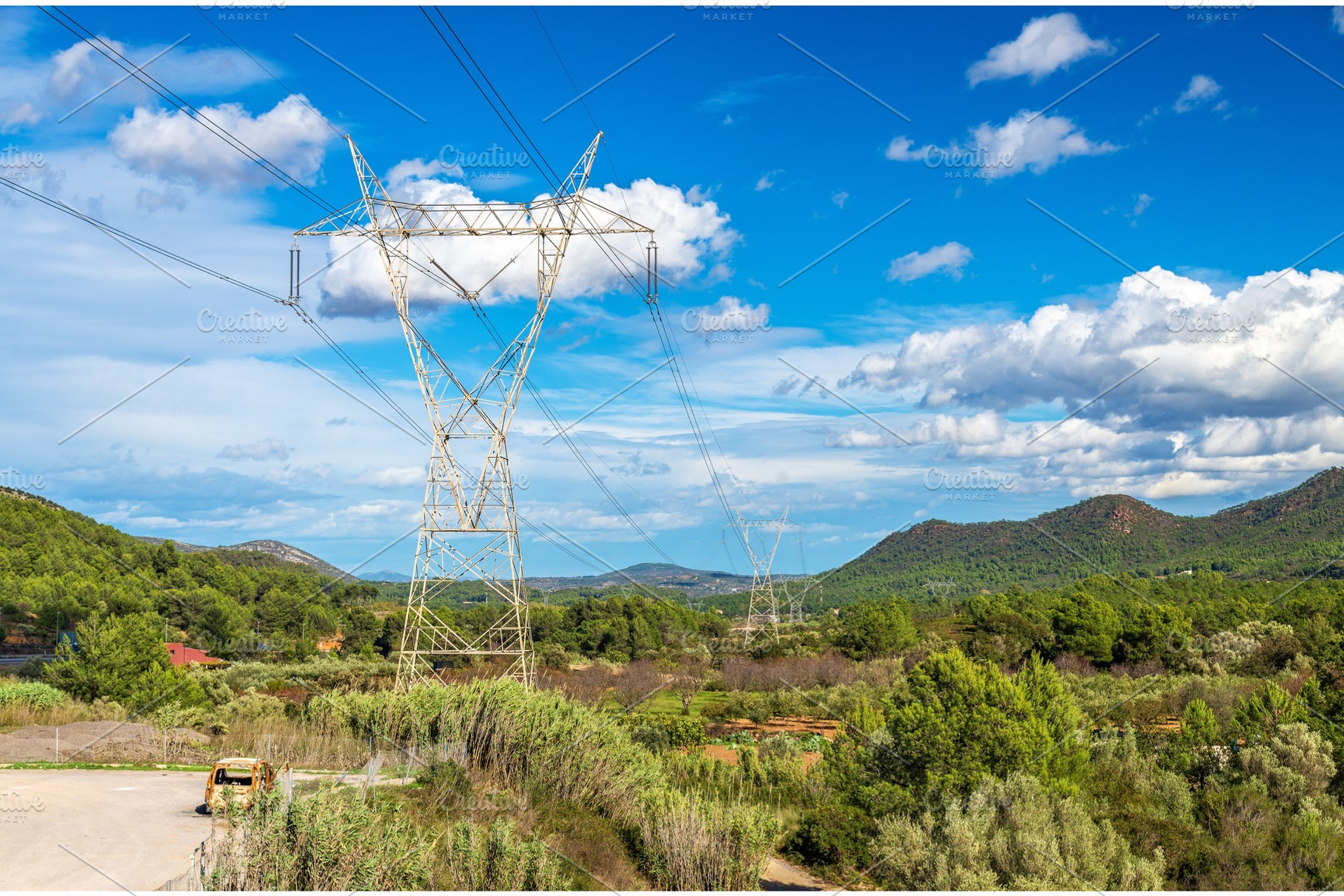 Electric power line and a landscape of the Valencian Community, Spain, a Nature Photo by Leonid Andronov