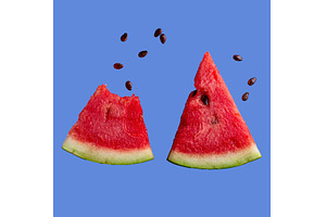 Sliced watermelon isolated on color, a Food & Drink Photo by Yulia Furman