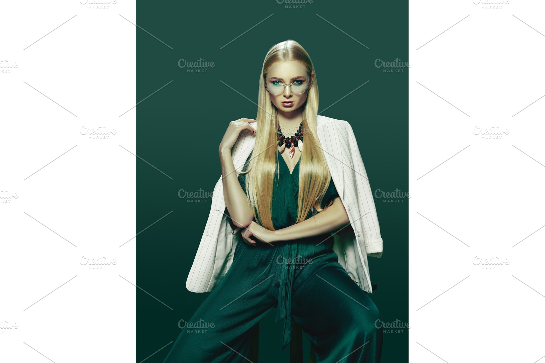 Blonde young woman in elegant green dress containing fashion, model, and, a Beauty & Fashion Photo by Volodymyr Melnyk