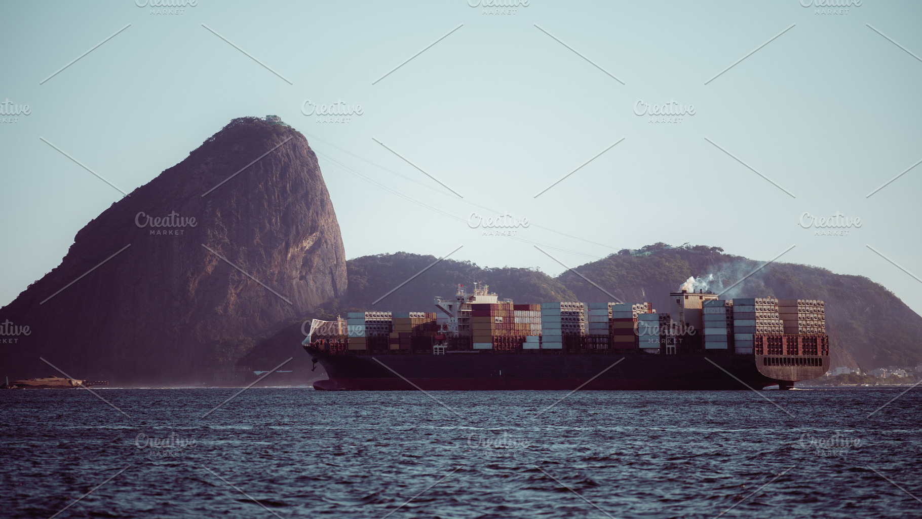 Cargo ship by Sugarloaf Mountain, a Transportation Photo by SkyNext