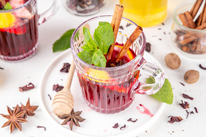 Tasty autumn non-alcohol hibiscus mulled wine drink, a Food & Drink Photo by Rimma