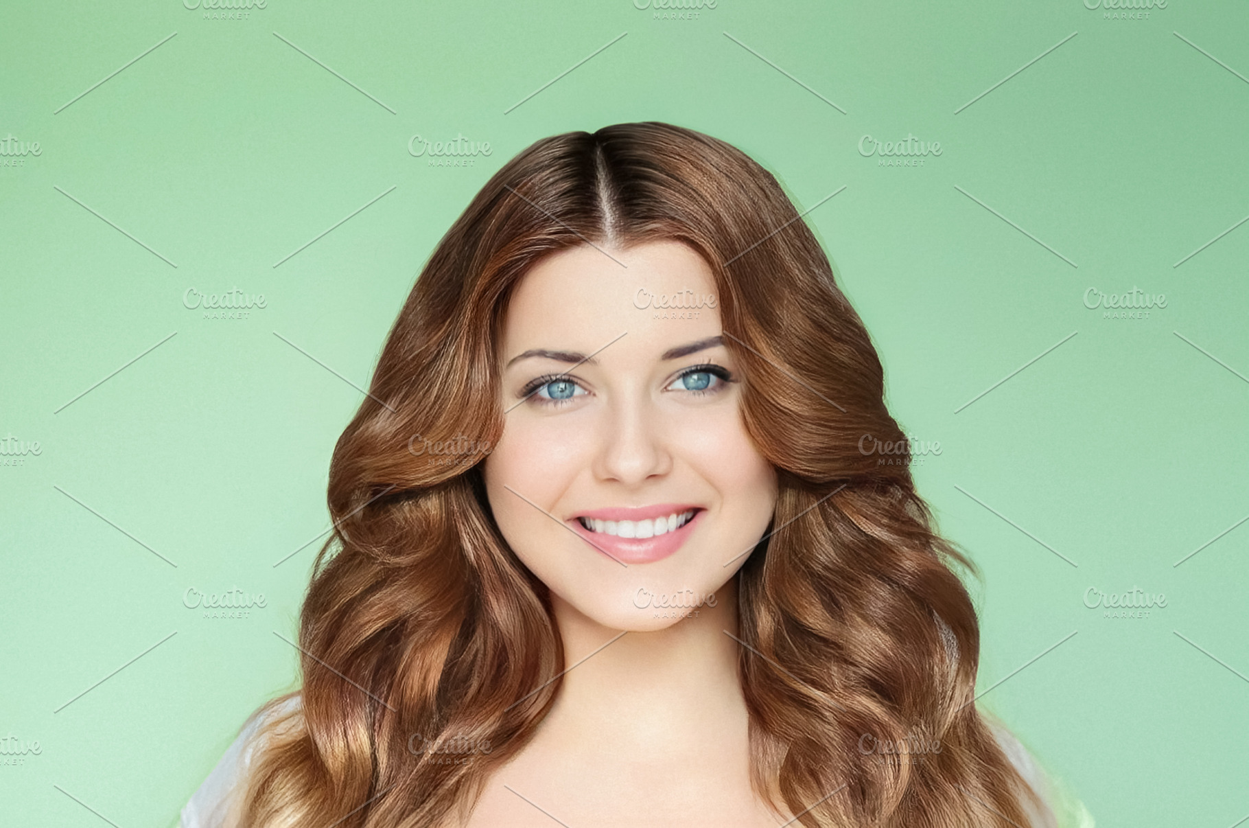Beautiful woman portrait smiling with happiness on light green b, a Person Photo by Studio ANNA